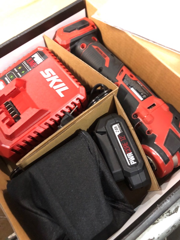 Photo 3 of **USED/DIRTY**
SKIL PWRCore 12 Brushless 12V Oscillating Tool Kit with 40pcs Accessories, Includes 2.0Ah Lithium Battery and PWRJump Charger - OS592702, Red Oscillating Tool Kit_V1