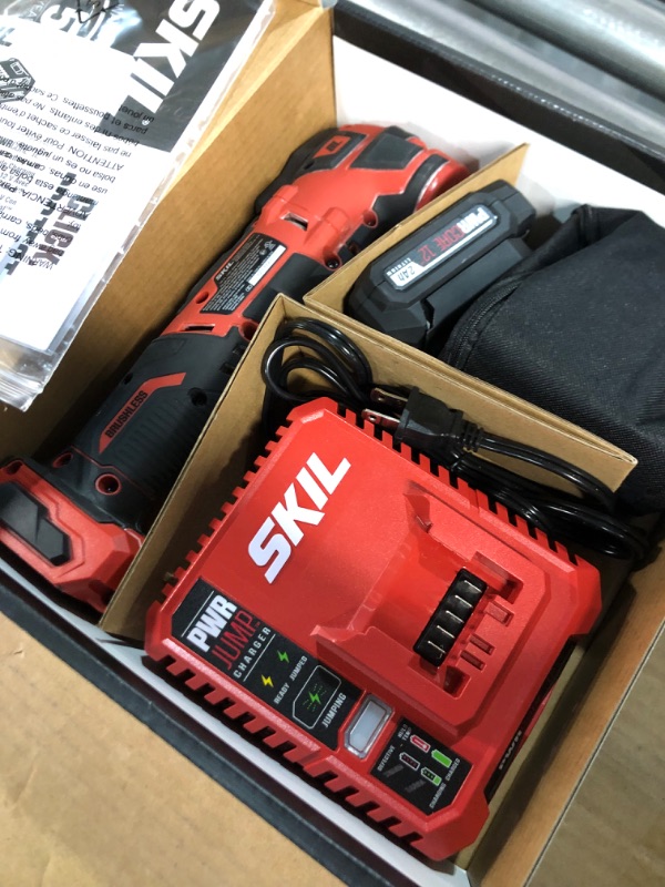 Photo 4 of **USED/DIRTY**
SKIL PWRCore 12 Brushless 12V Oscillating Tool Kit with 40pcs Accessories, Includes 2.0Ah Lithium Battery and PWRJump Charger - OS592702, Red Oscillating Tool Kit_V1