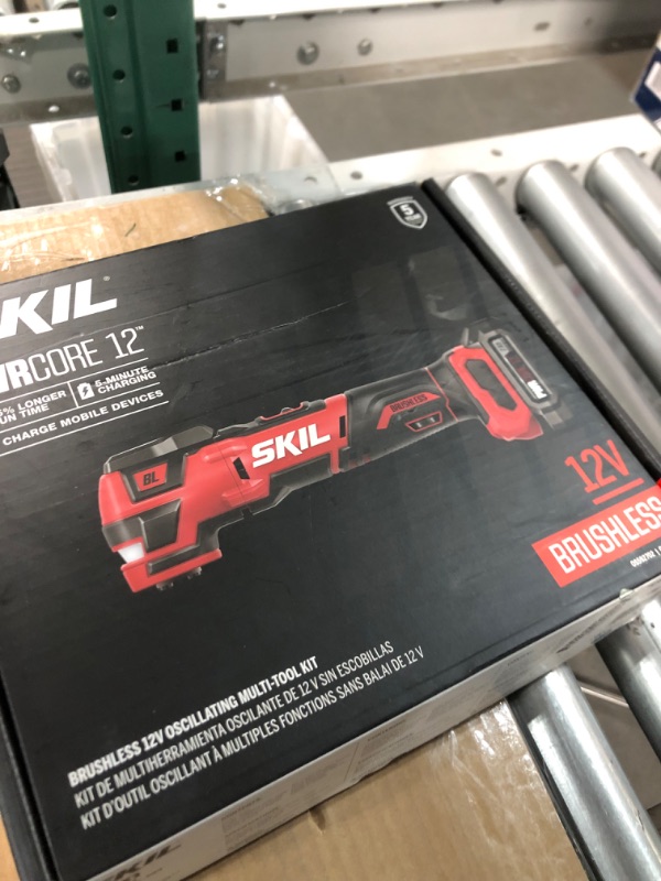 Photo 5 of **USED/DIRTY**
SKIL PWRCore 12 Brushless 12V Oscillating Tool Kit with 40pcs Accessories, Includes 2.0Ah Lithium Battery and PWRJump Charger - OS592702, Red Oscillating Tool Kit_V1