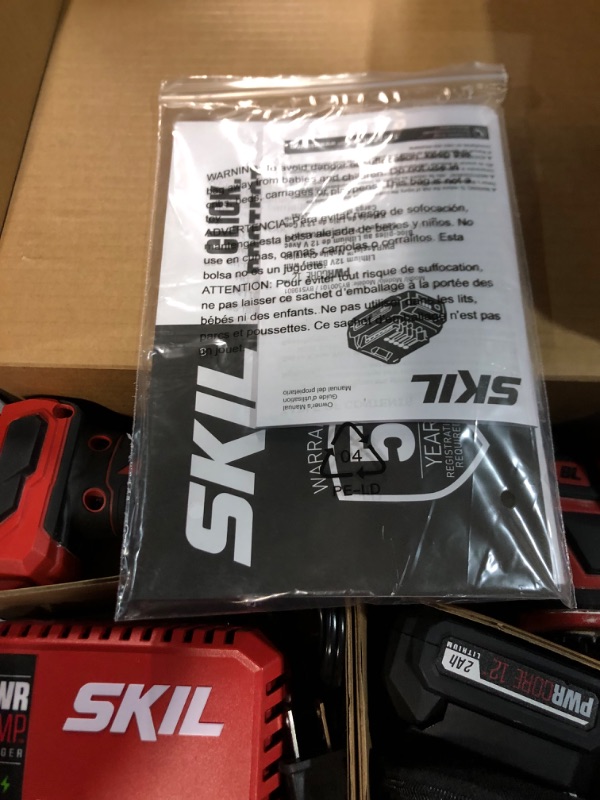 Photo 2 of **USED/DIRTY**
SKIL PWRCore 12 Brushless 12V Oscillating Tool Kit with 40pcs Accessories, Includes 2.0Ah Lithium Battery and PWRJump Charger - OS592702, Red Oscillating Tool Kit_V1