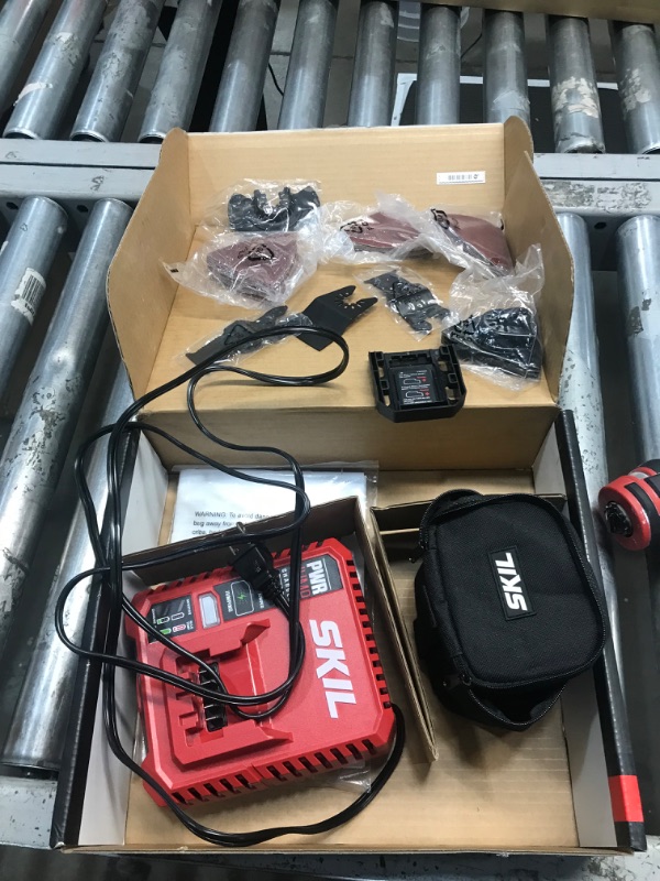 Photo 7 of **USED/DIRTY**
SKIL PWRCore 12 Brushless 12V Oscillating Tool Kit with 40pcs Accessories, Includes 2.0Ah Lithium Battery and PWRJump Charger - OS592702, Red Oscillating Tool Kit_V1