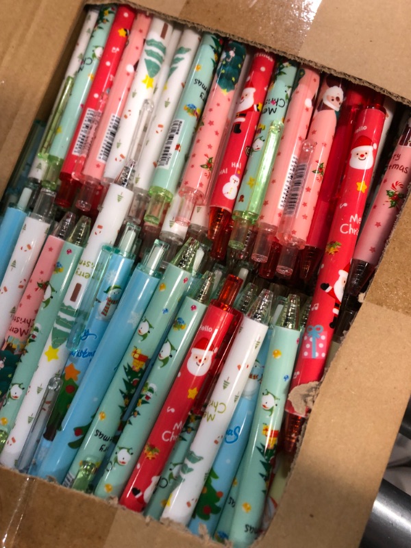 Photo 2 of Jetec 24 Pcs Christmas Pens Retractable Printing Pens Christmas Ballpoint Pens Xmas Gel Ink Pens Cartoon Tree Santa Snowman Writing Pens for Christmas Party Office School Supplies Children Gift