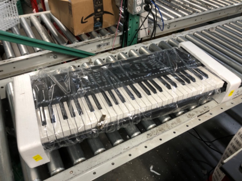Photo 2 of (PARTS ONLY)Alesis Melody 54 - Electric Keyboard Digital Piano with 54 Keys, Speakers, 300 Sounds, 300 Rhythms, 40 Songs, Microphone and Piano Lessons

