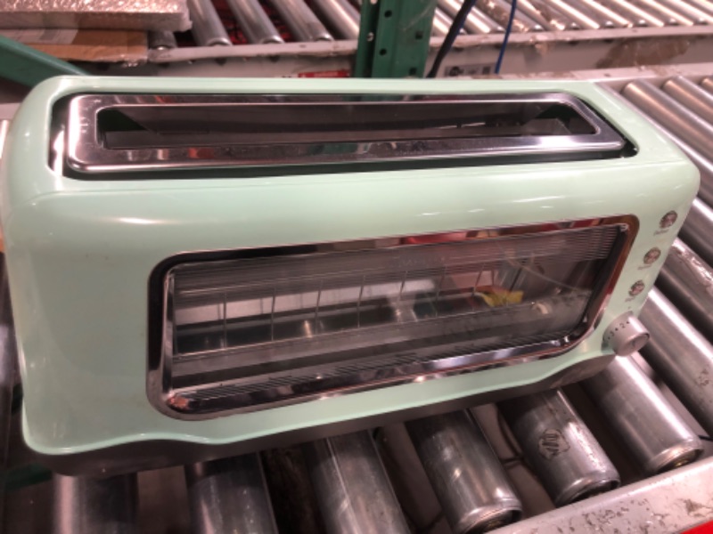 Photo 1 of **PARTS ONLY**
Dash Clear View Toaster: Extra Wide Slot Toaster with Stainless Steel Accents  Aqua