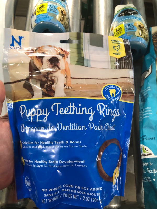 Photo 2 of (NO REFUNDS) Pet bundle Real salmon and brown rice recipe cat food, Puppy teething rings, and 2 Renuzit pure breeze pet