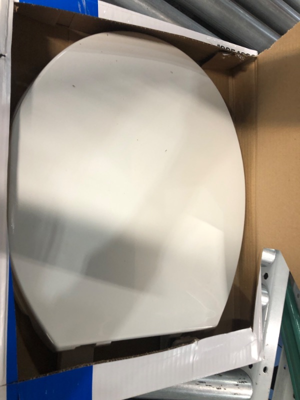 Photo 2 of  Closed Front White Plastic Deluxe Toilet Seat - 1 Each