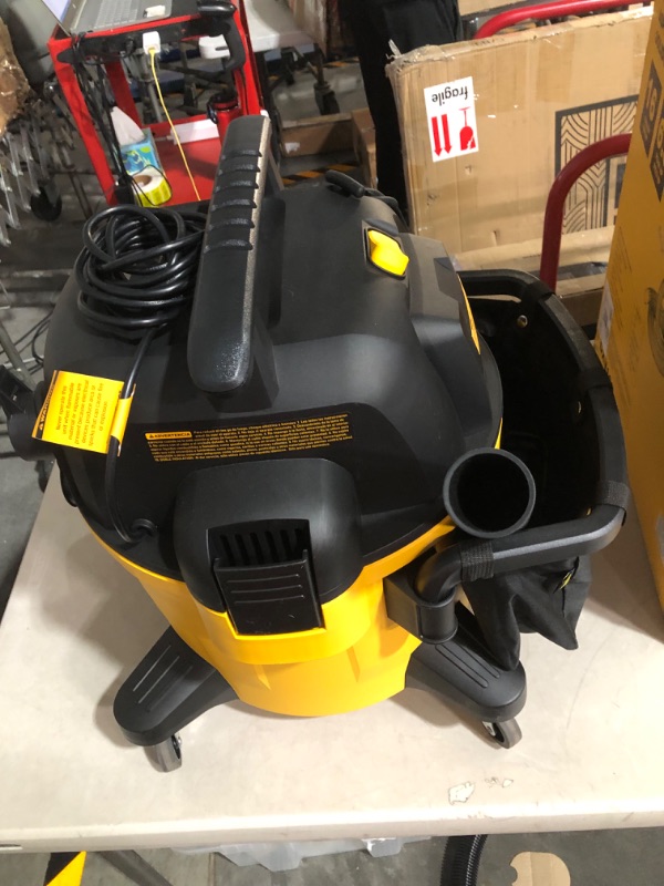 Photo 5 of **POWERS ON** **USED** **SEE NOTES** DEWALT 9 Gallon 34L Shop Vacuum -Yellow