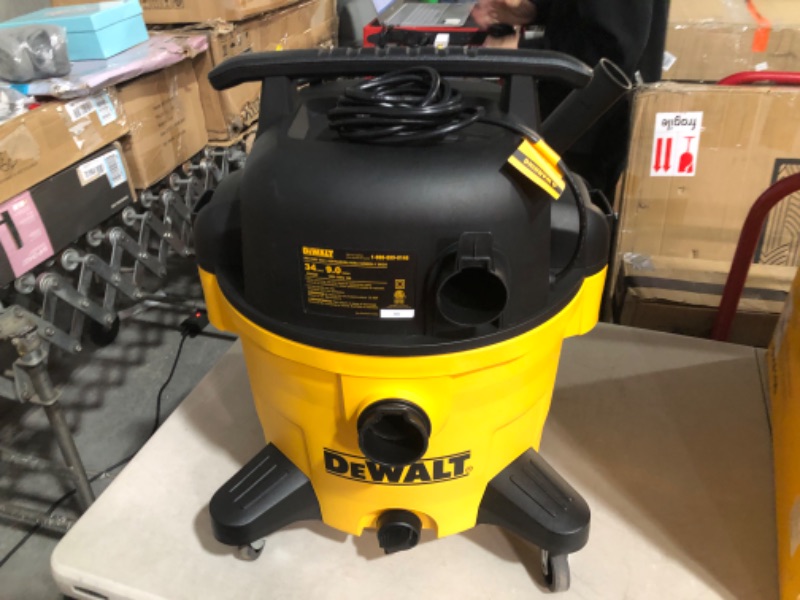 Photo 2 of **POWERS ON** **USED** **SEE NOTES** DEWALT 9 Gallon 34L Shop Vacuum -Yellow