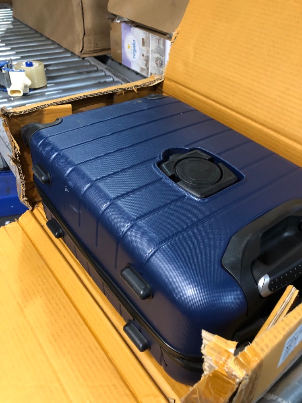 Photo 2 of **HEAILYUSED/DAMAGED**
Wrangler Smart Luggage Set with Cup Holder and USB Port, Navy Blue, 20-Inch