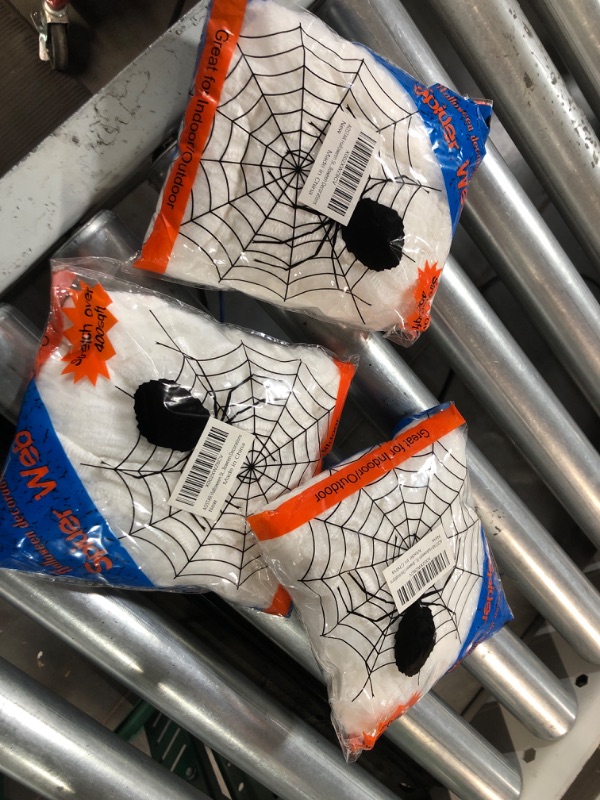 Photo 2 of AOSTAR Halloween Stretch Spider Webs Indoor & Outdoor Spooky Spider Webbing with 50 Fake Spiders for Halloween Decorations 3 pack