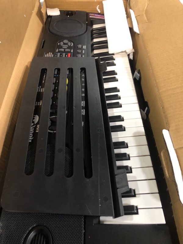 Photo 1 of **DAMAGE**
RockJam 49 Key Keyboard Piano with Power Supply