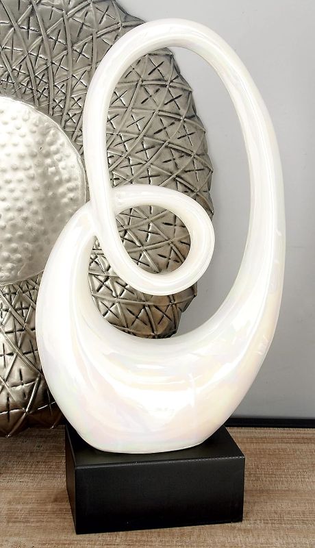 Photo 1 of *minor damage*
Deco 79 Ceramic Abstract Swirl Sculpture with Black Base, 10" x 5" x 21", White