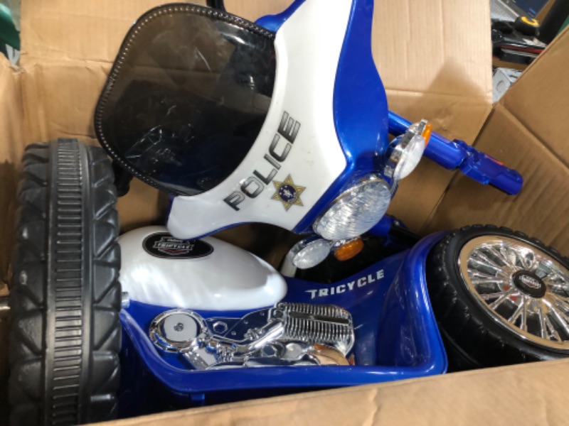 Photo 1 of *used*
Lil Rider Mini Battery-Operated Three-Wheel Police Chopper in Blue