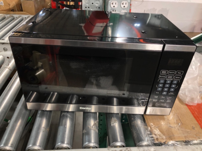 Photo 1 of ***POWERS ON - UNABLE TO TEST FURTHER***
Danby DDMW007501G1 Countertop Microwave, Stainless Steel, 12.31"D x 17.81"W x 10.31"H