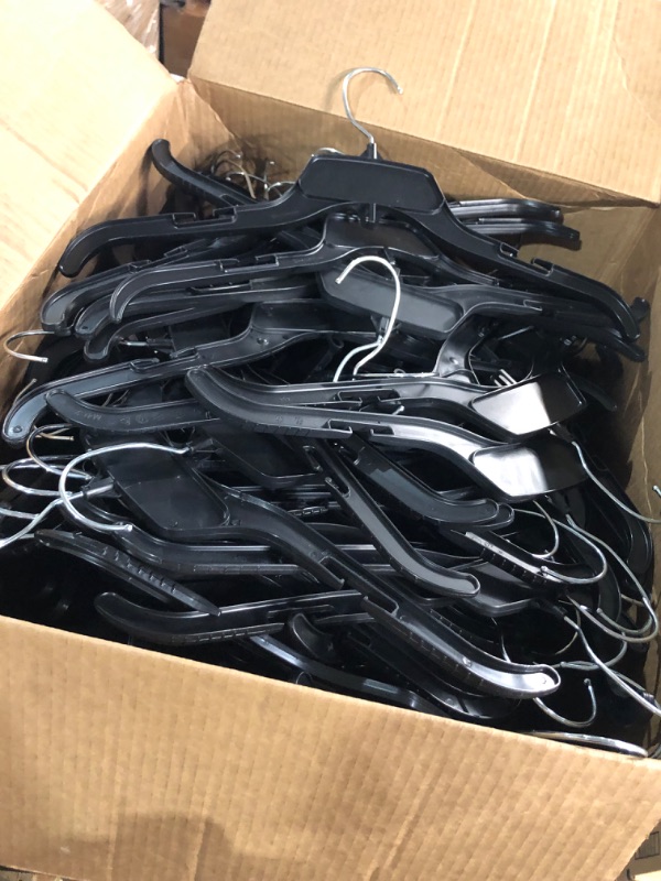 Photo 2 of *Stock photo for reference** Box of black clothes hangers, unknown amount