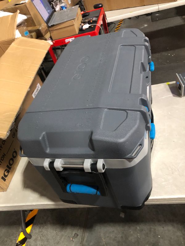 Photo 4 of ***MAJOR DAMAGE - SEE PICTURES***
Igloo BMX 72 Quart Cooler with Cool Riser Technology, Fish Ruler, and Tie-Down Points Carb/Grey/Blue