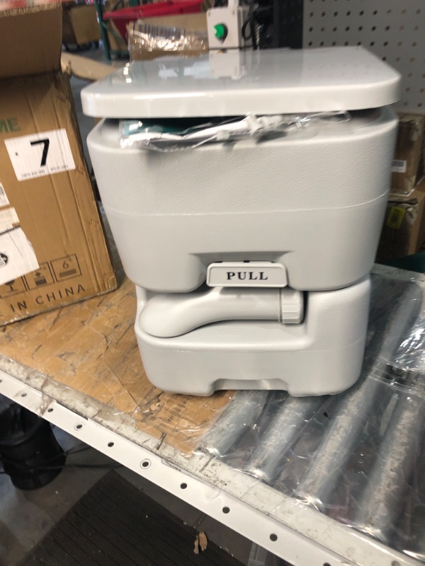 Photo 1 of YITAHOME 5.3 Gallon Portable Travel Toilet RV Potty Upgrade Double Outlet Water Spout Handle Flush Pump Detachable Water Tank with Drag Wheel for Camping Boating Hiking Trips