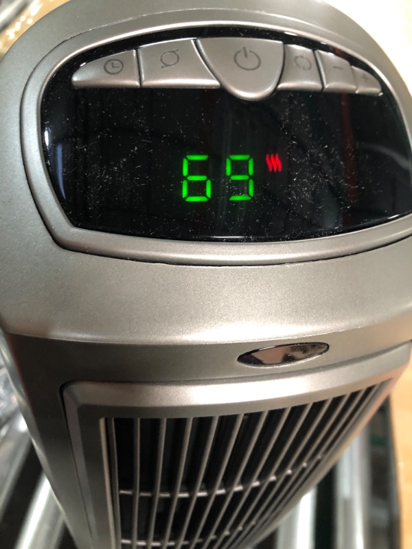 Photo 2 of **USED BUT LOOKS NEW - TURNS ON**
Lasko 1500W Digital Ceramic Space Heater with Remote, 755320, Silver