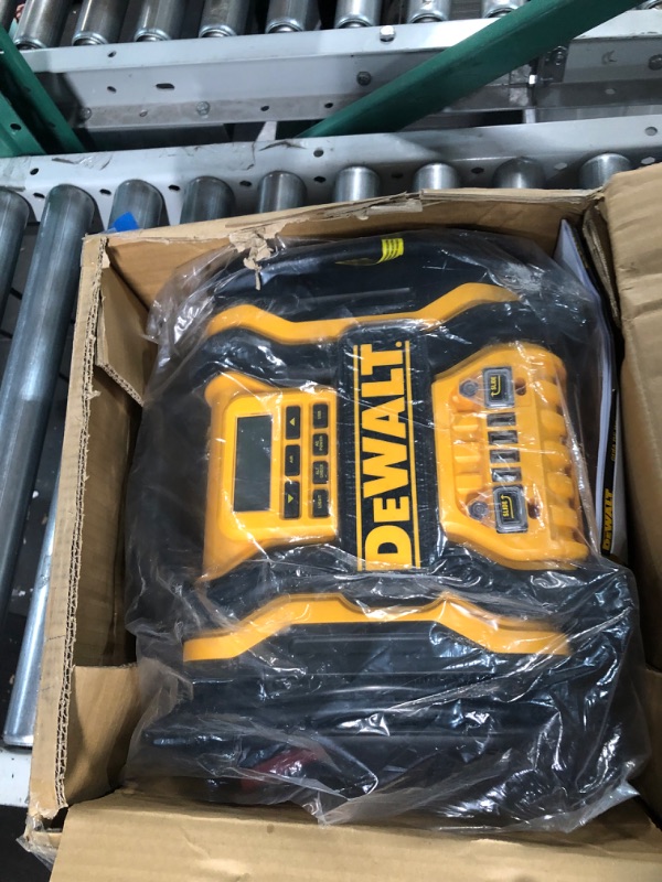 Photo 2 of DEWALT DXAEPS14 1600 Peak Battery Amp 12V Automotive Jump Starter/Power Station with 500 Watt AC Power Inverter, 120 PSI Digital Compressor, and USB Power , Yellow