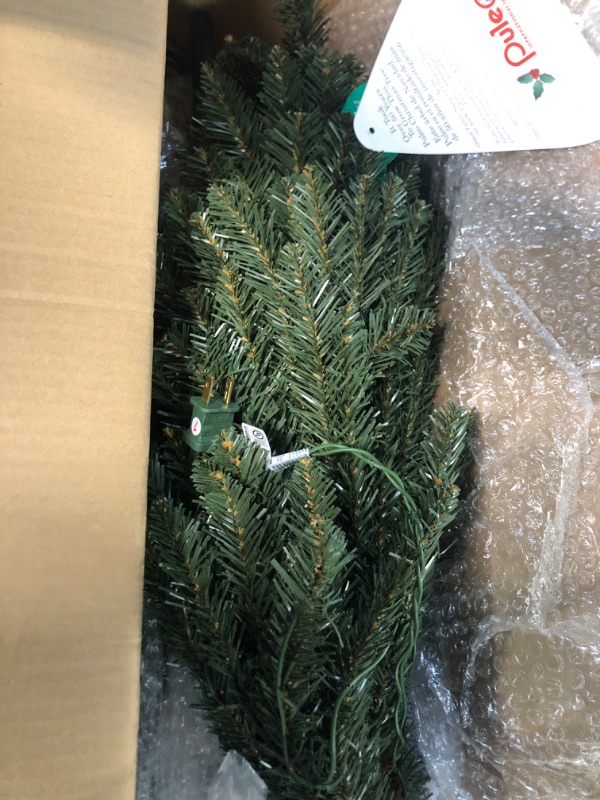 Photo 4 of *PARTS ONLY DOES NOT FULLY FUNCTION SEE NOTES*
Puleo International 4.5 Foot Pre-Lit Aspen Fir Artificial Christmas Tree 