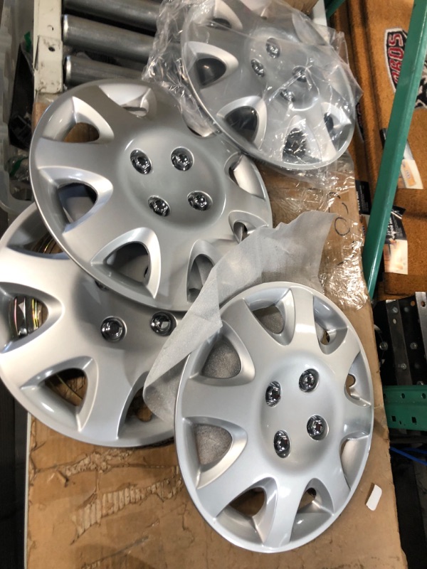 Photo 2 of KT Four ABS Plastic Silver Colored Hubcaps - 14 Inch Diameter