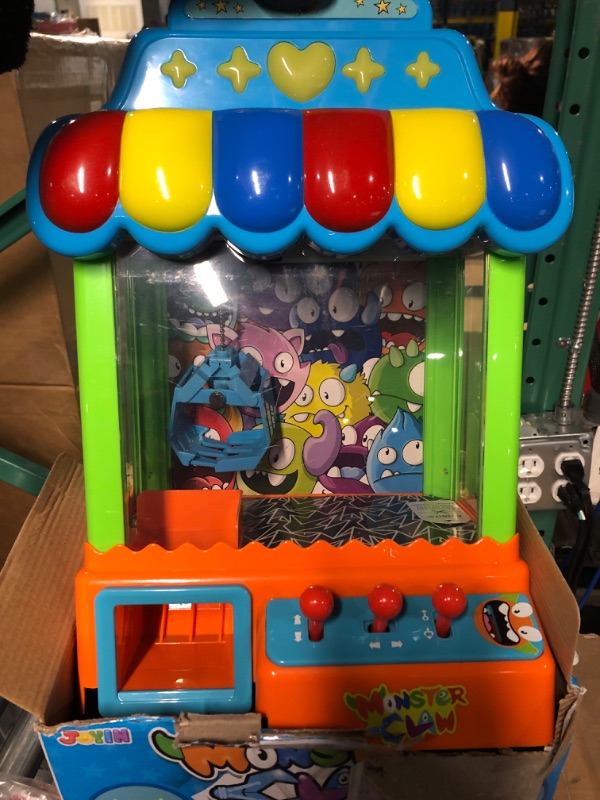 Photo 2 of JOYIN 32Pcs Claw Machine Toys with Lights & Sounds, Mini Arcade Machine with 10 Plush  Claw Game Vending Grabber Machine for Kids Birthday Gift