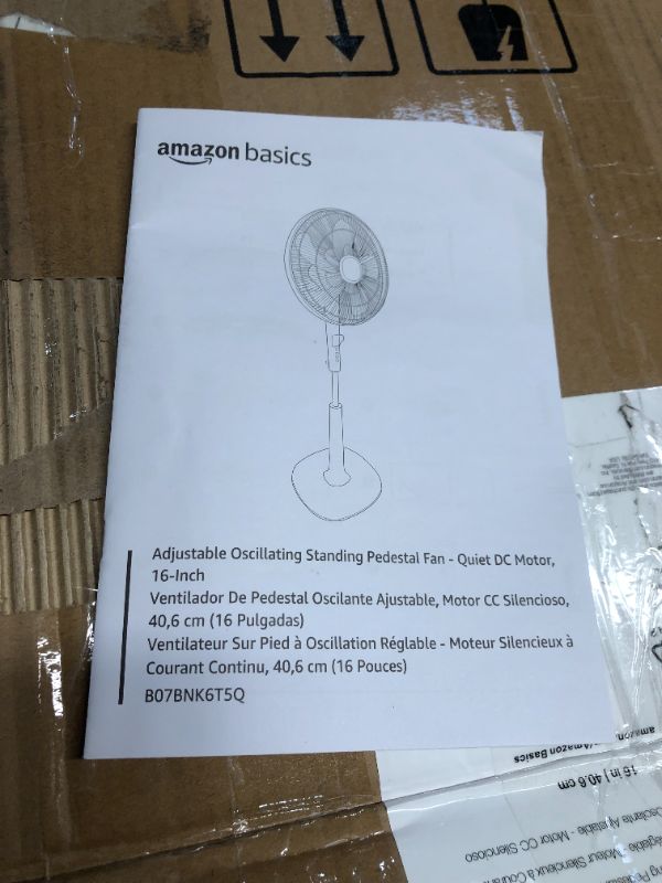 Photo 5 of ***NONREFUNDABLE - NOT FUNCTIONAL - FOR PARTS ONLY - SEE COMMENTS***
Amazon Basics Oscillating Dual Blade Standing Pedestal Fan with Remote - Quiet DC Motor, 16-Inch