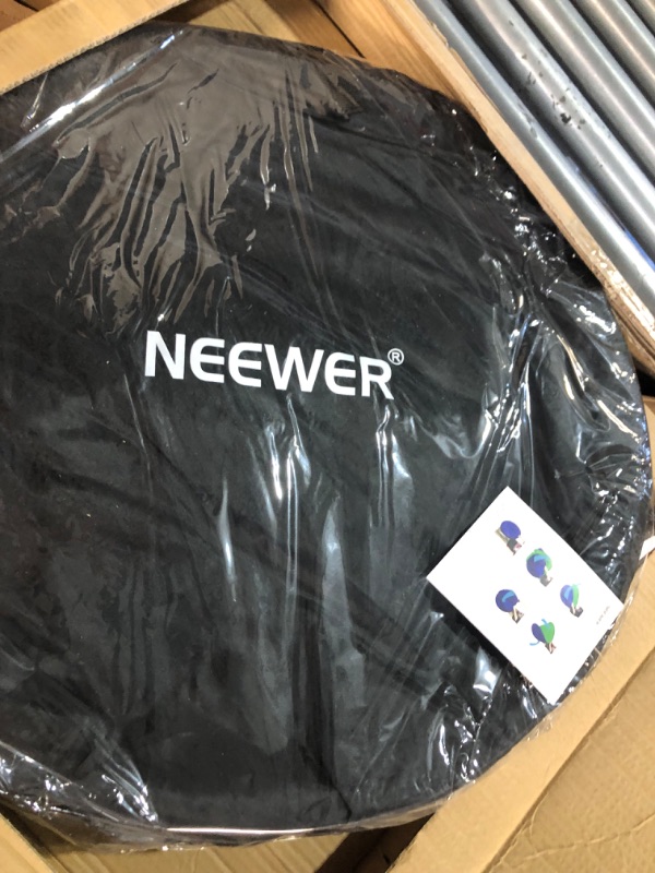 Photo 2 of NEEWER 59"x79"/150x200cm Light Reflectors for Photography, Portable 5 in 1 Collapsible Multi Disc with Bag - Translucent, Silver, Gold, Black, White Diffuser for Studio and Outdoor Lighting 150cm x 200 cm