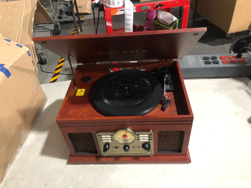 Photo 2 of ***POWERS ON - RADIO WORKS - UNABLE TO TEST OTHER COMPONENTS***
Victrola Navigator 8-in-1 Classic Bluetooth Record Player with USB Encoding and 3-Speed Turntable