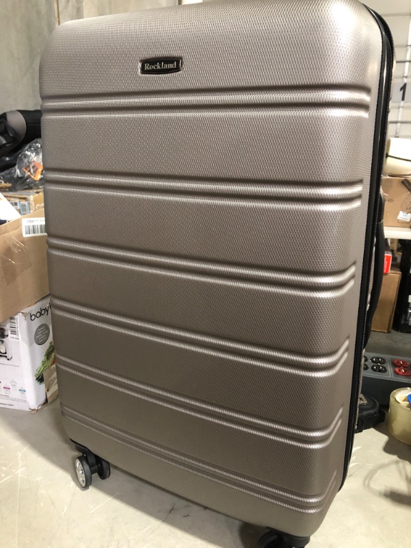 Photo 2 of * used * see all images * 
Rockland Melbourne Hardside Expandable Spinner Wheel Luggage, Silver, 2-Piece Set