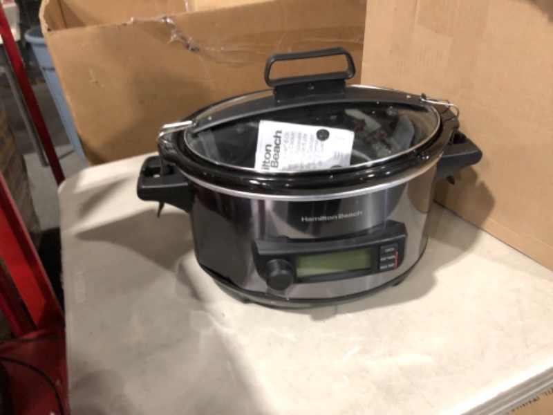 Photo 2 of ***MAJOR DAMAGE - DENTED - SEE PICTURES - POWERS ON***
Hamilton Beach Portable 6-Quart Digital Programmable Slow Cooker With Temp Tracking