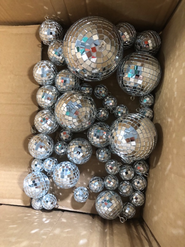 Photo 1 of **SEE PHOTOS** Set of 4", 3", 2", & 1" Disco Balls