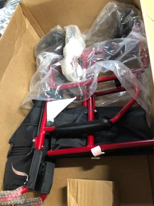 Photo 7 of ***ONE OF THE FOOT RESTS IS MISSING***
Medline Ultralight Transport Wheelchair with 19” Wide Seat, Folding, Red Frame