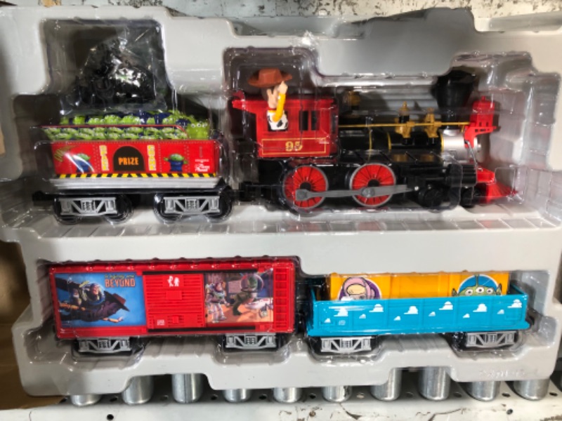 Photo 3 of **USED BUT APPEARS NEW** Lionel Disney Pixar's Toy Story Ready-to-Play Battery Powered Model Train Set with Remote Ready to Play Set