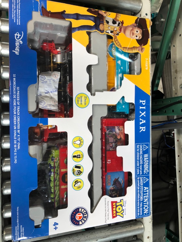 Photo 2 of **USED BUT APPEARS NEW** Lionel Disney Pixar's Toy Story Ready-to-Play Battery Powered Model Train Set with Remote Ready to Play Set