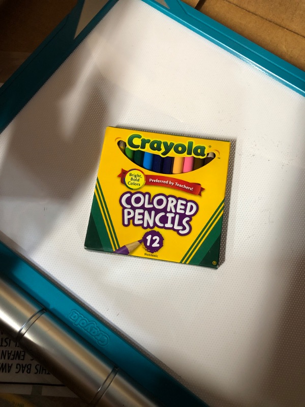 Photo 1 of Crayola Light Up Tracing Pad Teal & Twistables Crayons Coloring Set, Back to School Gifts for Kids, Preschool Essentials, 50 Count [Amazon Exclusive] Teal Pad + Coloring Set