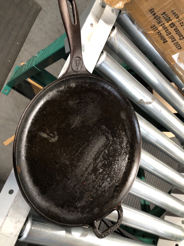 Photo 2 of *GREASY** Victoria 12-Inch Cast-Iron Comal Pizza Pan with a Long Handle and a Loop Handle, Preseasoned with Flaxseed Oil, Made in Colombia 12 Inch