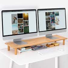 Photo 1 of Bamboo Dual Monitor Shelf for 2 Monitors, ROCDEER Monitor Stand Riser, Underneath Storage for Desk Office Supplies, and Supports for Computer Monitor, Heavy TV Riser up to 130 lbs, Natural