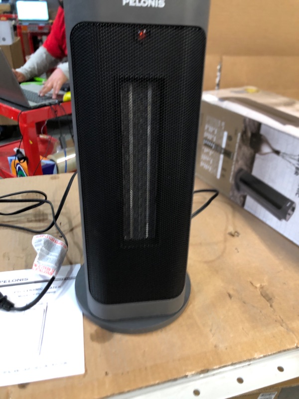 Photo 1 of PELONIS PTH15A2BGB 1500W Fast Heating Space Heater, Programmable Thermostat, Easy Control, Widespread Oscillation, Over Heating & Tip-over Switch Protection, 7.72 x 7.72 x 17.76 Inches, Gray , Grey