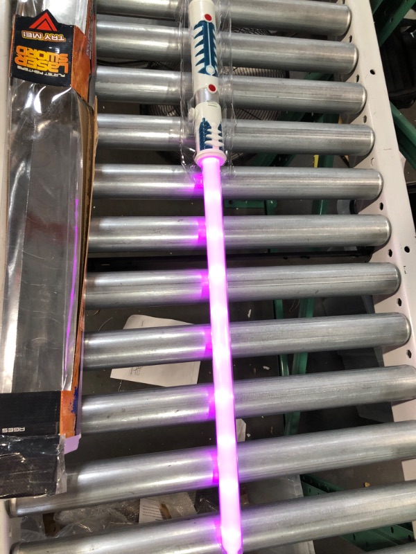 Photo 3 of 2-in-1 LED Light Up Sword FX Pink Toy Saber with Motion Sensitive Sound Effects (29 Inches)