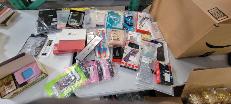 Photo 2 of AS IS NONREFUNDABLE Cel phone accessories. All New Items