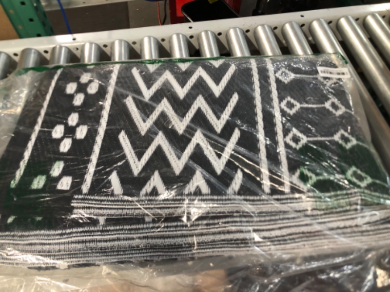 Photo 2 of **USED** Reversible Mats - Outdoor Rugs 9'x12' for Patios Clearance, Plastic Straw Rugs Waterproof, Portable, Black & Cream White 9x12ft