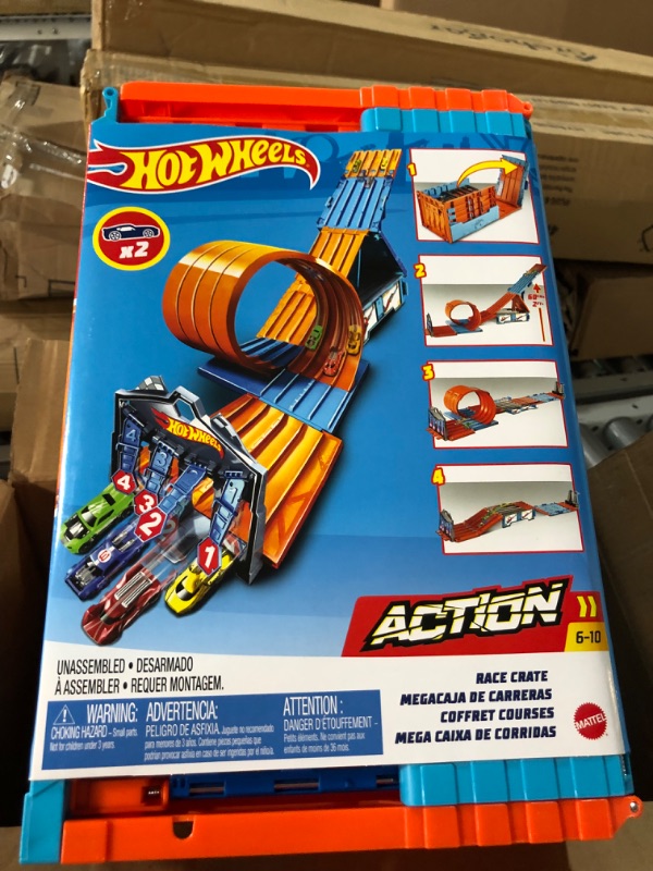 Photo 2 of ?€?Hot Wheels Race Crate with 3 Stunts in 1 Set Portable Storage Ages 6 to 10 [Amazon Exclusive] & Set Of 10 1:64 Scale Toy Trucks And Cars For Kids And Collectors (Styles May Vary) [Amazon Exclusive] Race Tracks + Hot Wheels Set Of 10