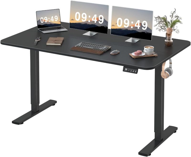 Photo 1 of **SEE NOTES** Electric Height Adjustable Standing Desk Large 55 x 24 Inches Sit Stand Up Desk