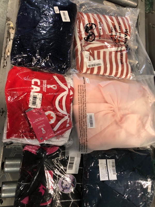 Photo 1 of Lot of different clothes