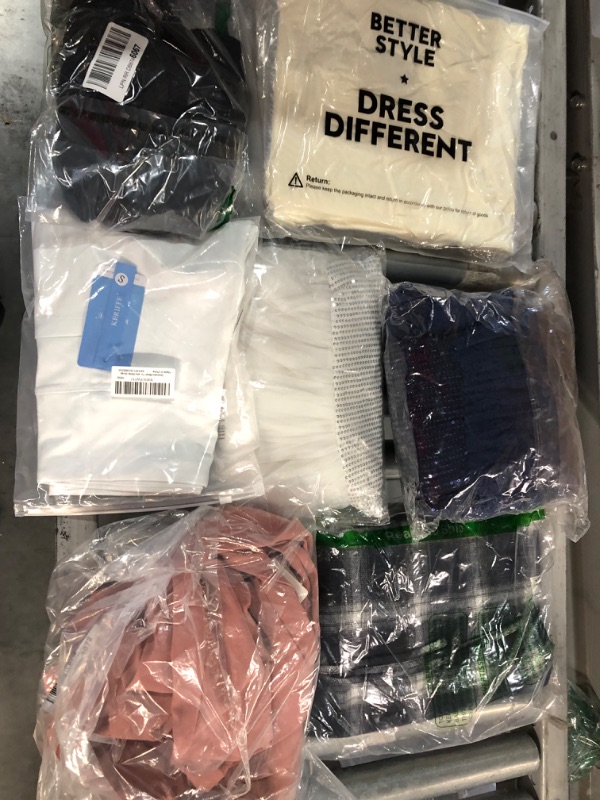 Photo 1 of Lot of different clothes