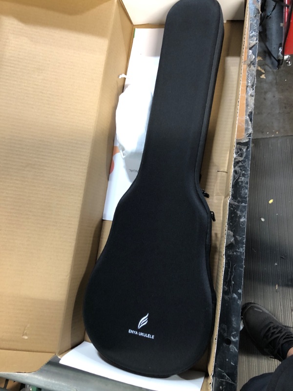 Photo 3 of ***MAJOR DAMAGE - HEAD AND STRINGS BROKEN OFF - SEE PICTURES***
Enya Concert Ukulele Nova U 23’’ Carbon Fiber Travel Ukulele, Black