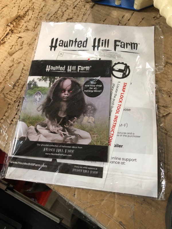 Photo 3 of Haunted Hill Farm Motion-Activated Crouching Grave Digger by Tekky, Talking Scare Prop Animatronic for Indoor or Covered Outdoor Creepy Halloween Decoration, Plug-in or Battery Operated 48" Crouching Grave Digger