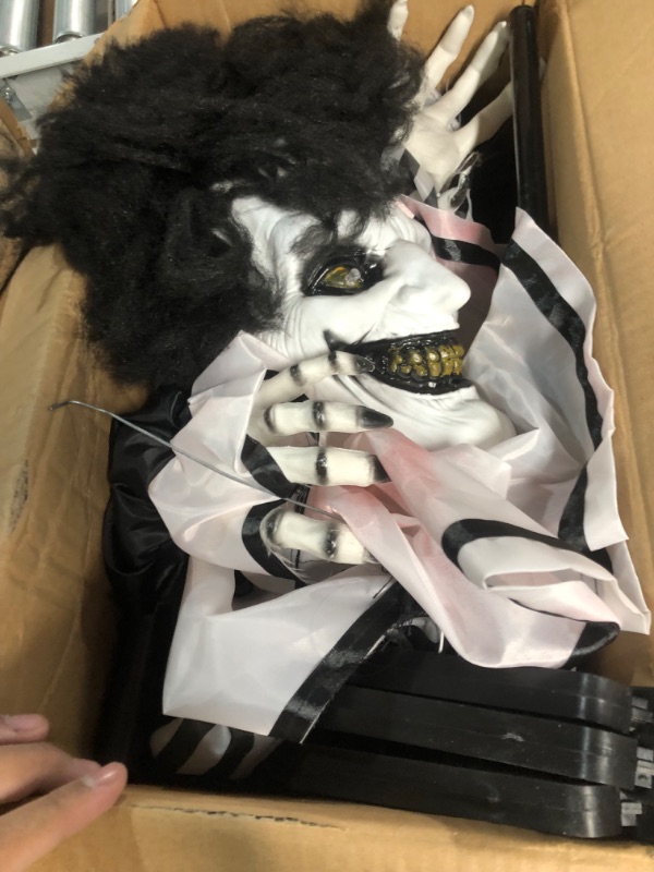 Photo 2 of Haunted Hill Farm Life-Size Scary Animatronic Talking Clown with Touch Activated Lights and Sounds, Battery Operated Indoor or Covered Outdoor Halloween Decoration 67" Creepy Clown