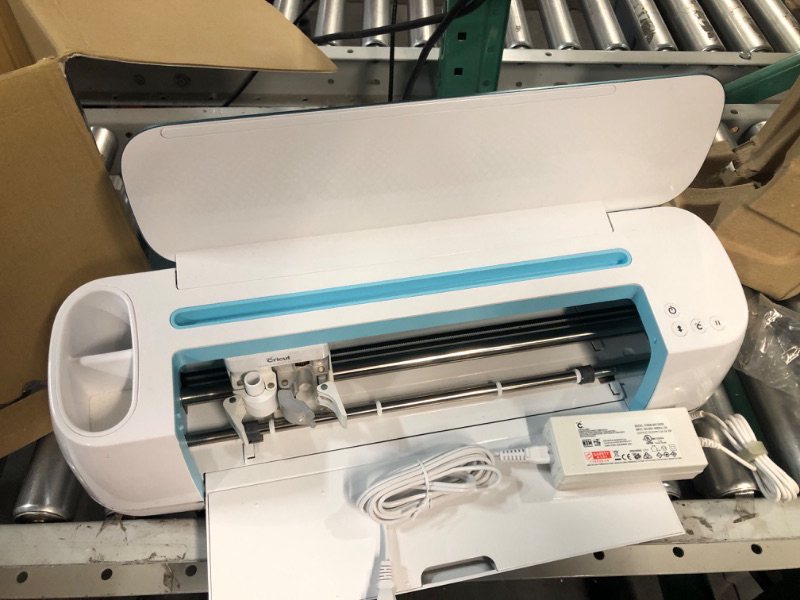 Photo 4 of **TURNS ON APPEARS IN GOOD CONDITION** Cricut Maker in Blue & Digital Content Library Bundle - Smart Cutting Machine Compatible with iOS, Android, Windows & Mac